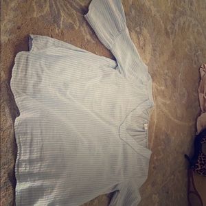 Lot of clothes shirts and sweaters. Xs or sm